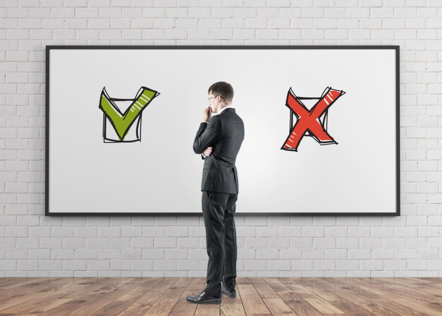 man looking at a whiteboard denoting the difference between Islamic mortgage and traditional mortgages