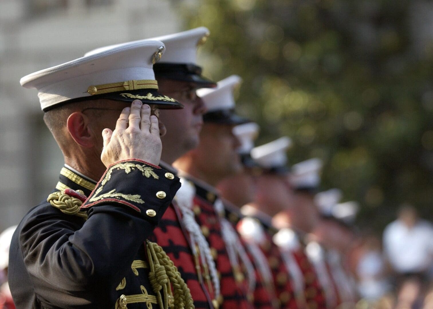pexels-pixabay-40546 Uniformed military personnel performing a salute in a formal ceremony at a Residential Program in the US.