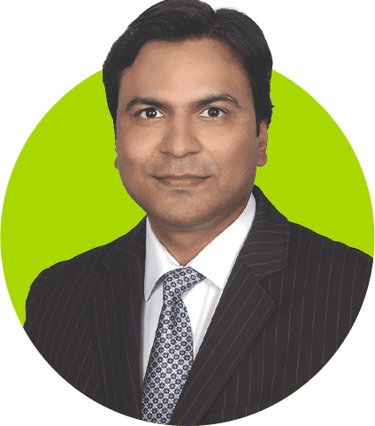 A preferred professional portrait of a man wearing a pinstripe suit and tie against a green background.